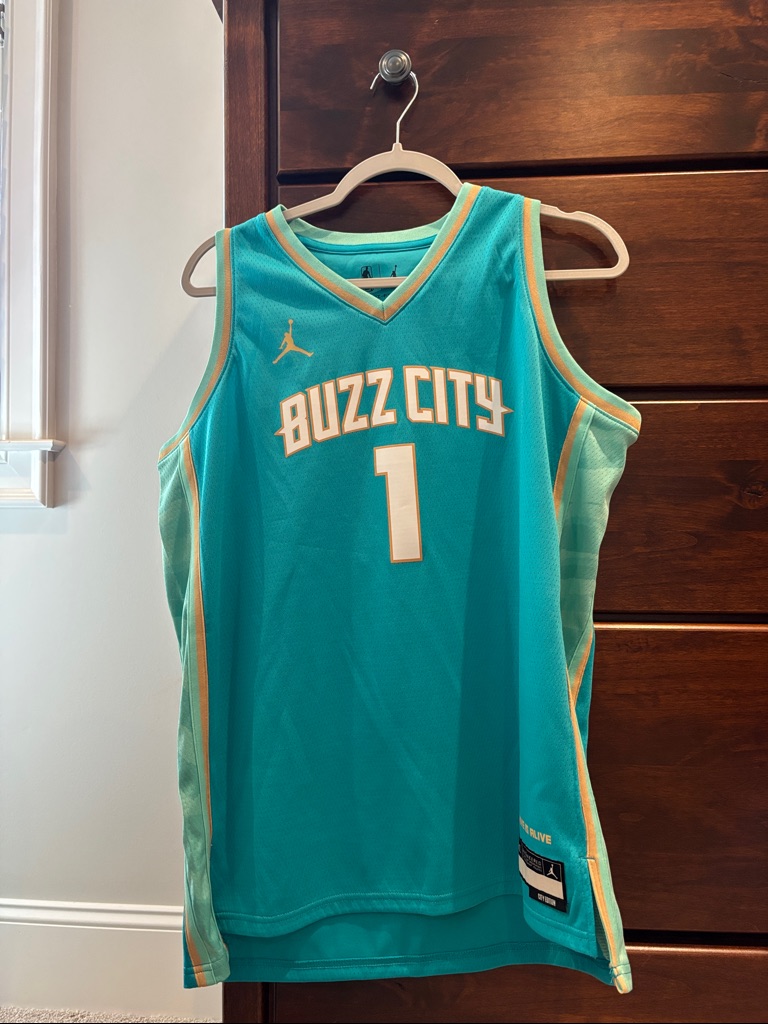 Jordan Teal & Mint Buzz City #1 Basketball Jersey